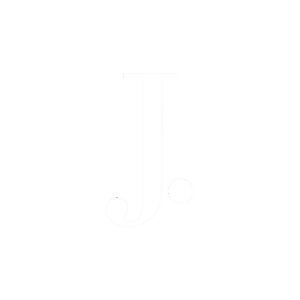 J.